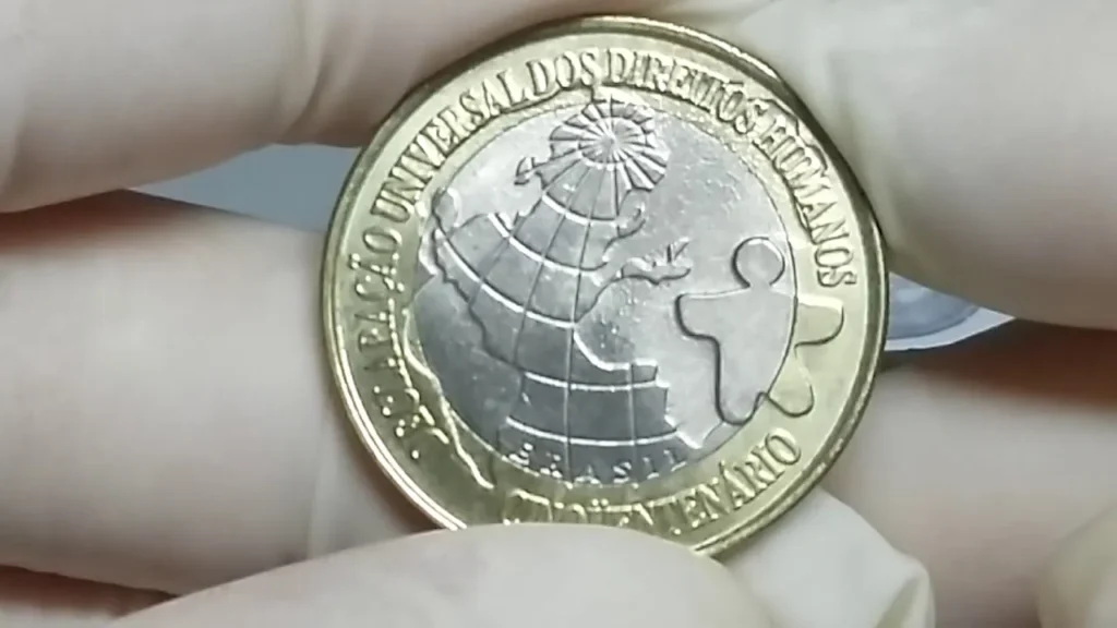 É para pular de alegria! Moeda icônica dos DIREITOS HUMANOS pode valer mais de R$6.000,00 hoje (08/05/2024)